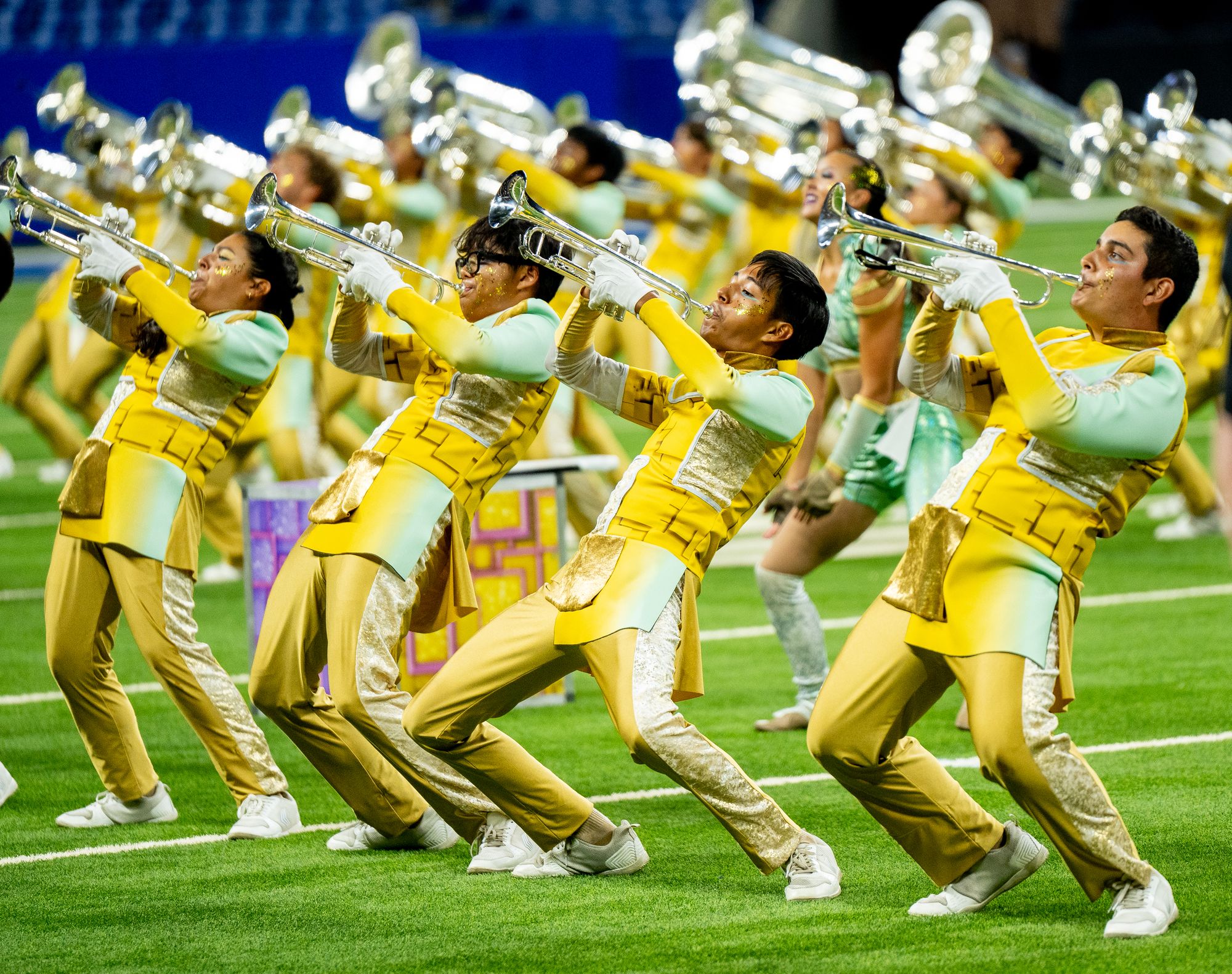 Gold brass line playing in unison
